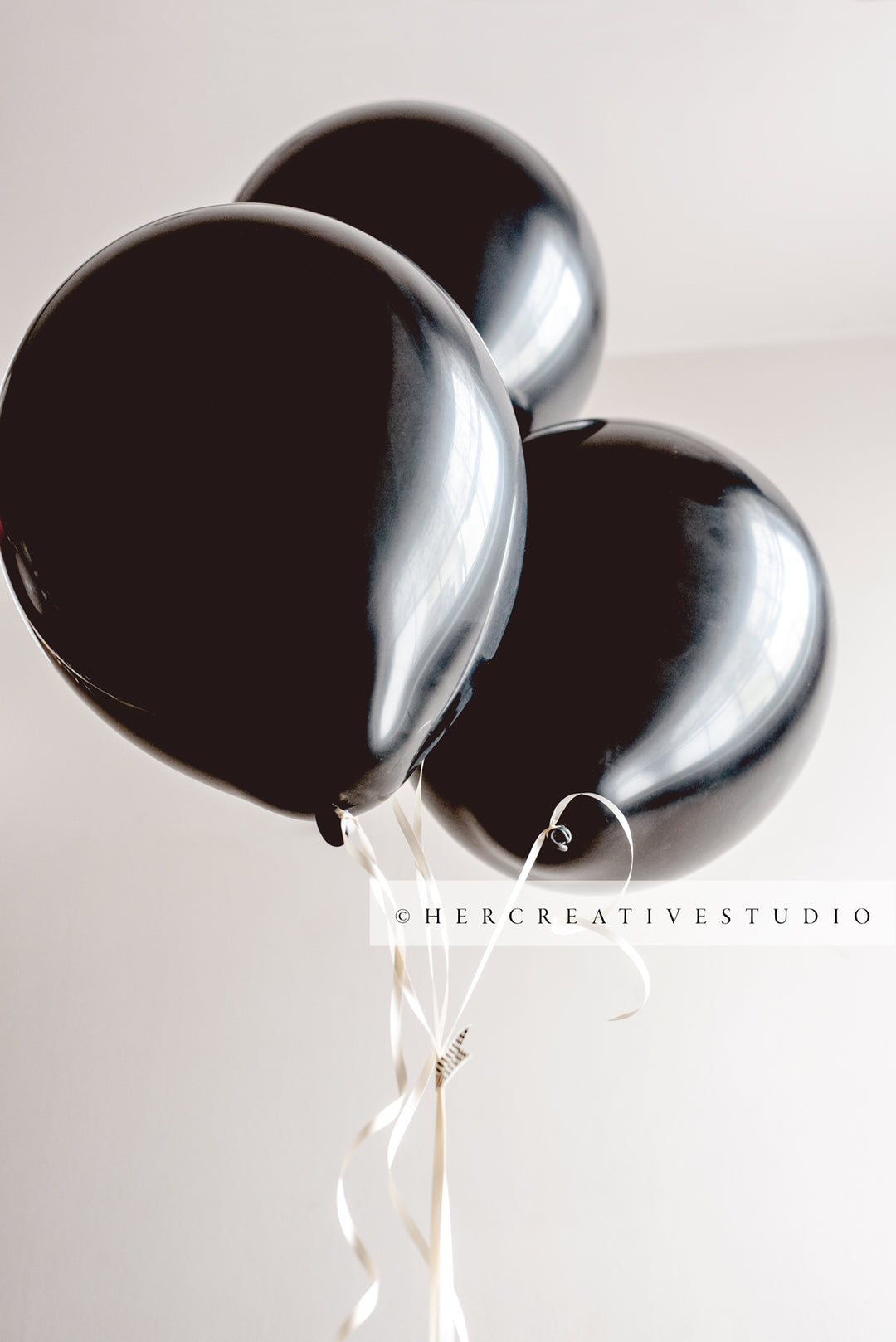 Three Black Balloons, Styled Stock Image