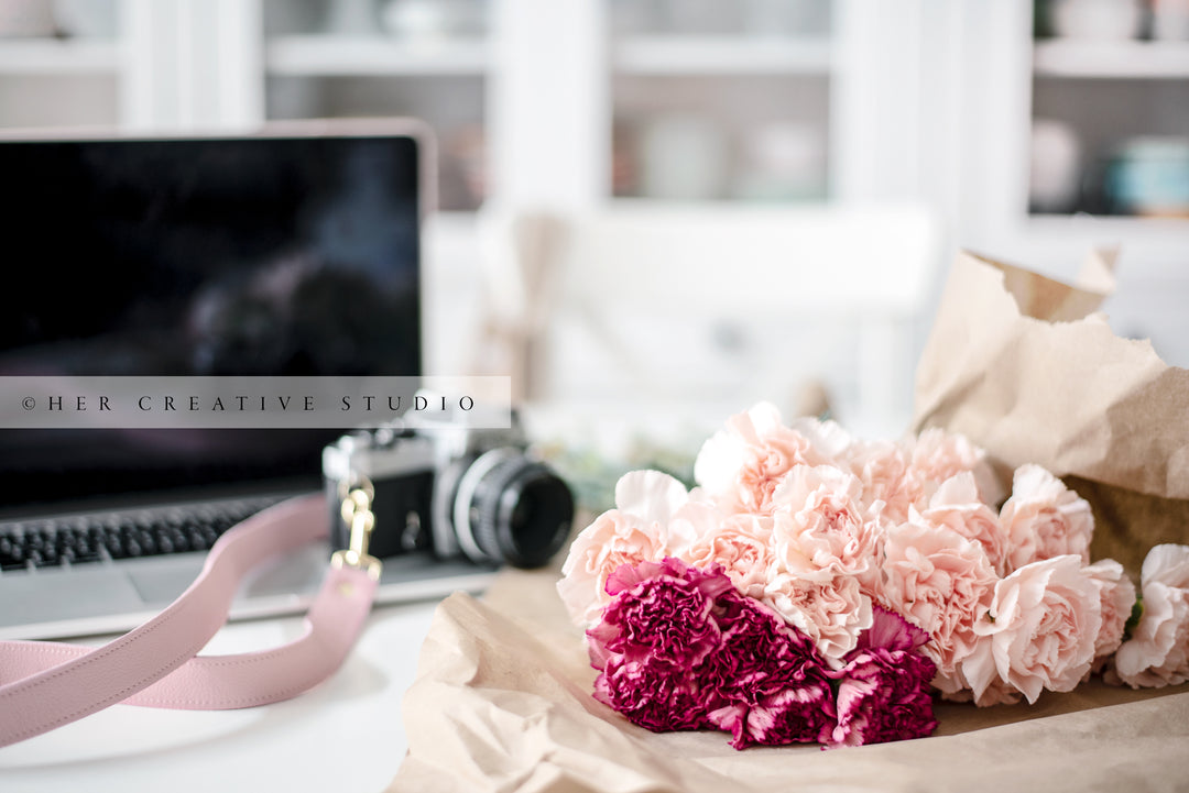 Flowers & Camera on White Workspace, Styled Image