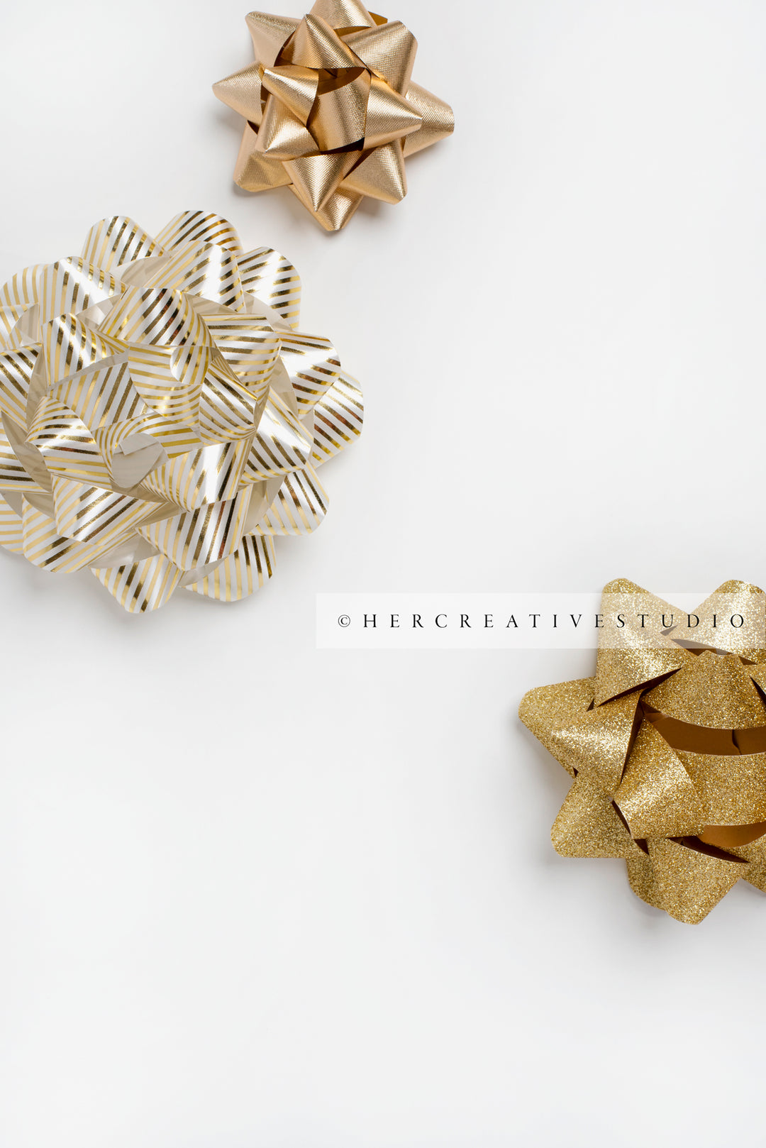 Gold Holiday Bows on White Background, Styled Image
