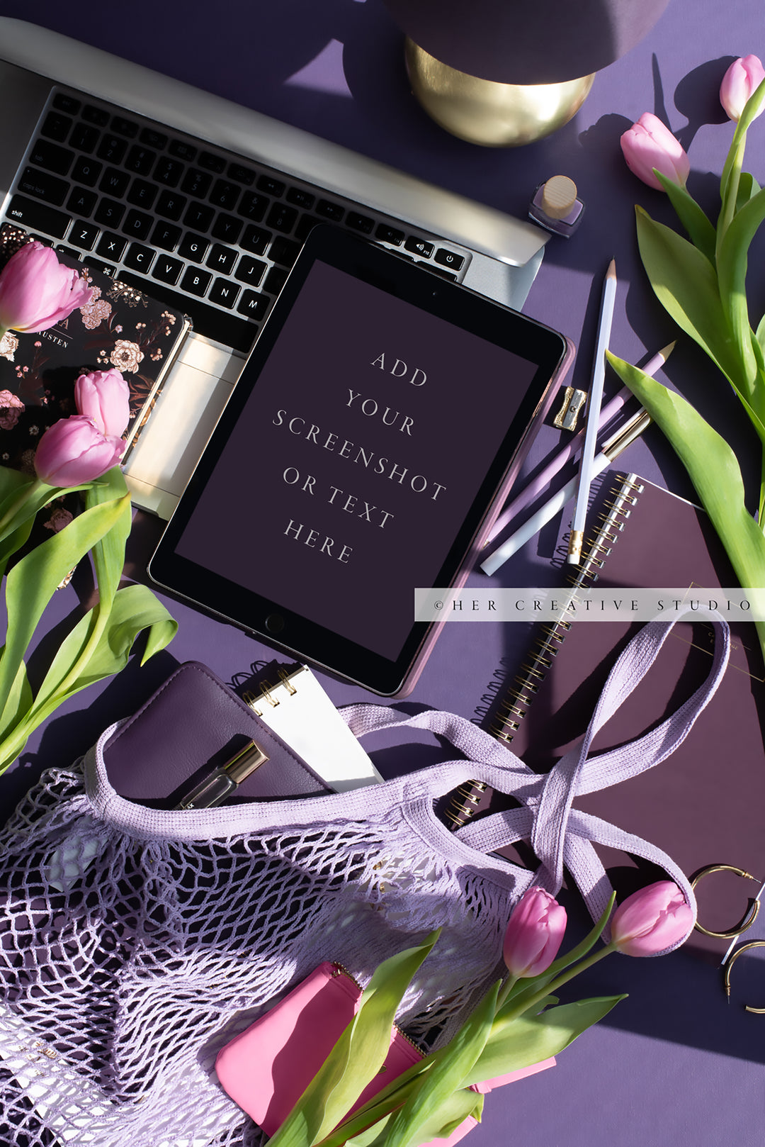 Tablet Mockup with Purple Notebooks