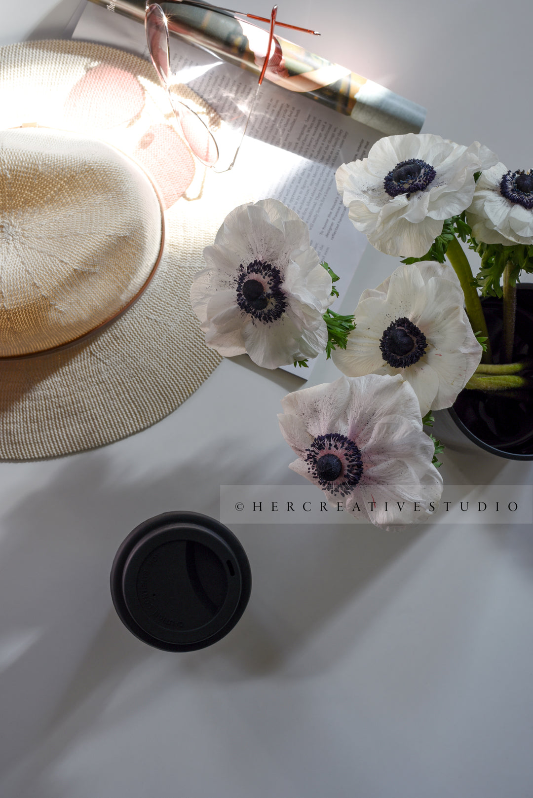 Panama Hat, Coffee & Anemone in Sunlight, Styled Image