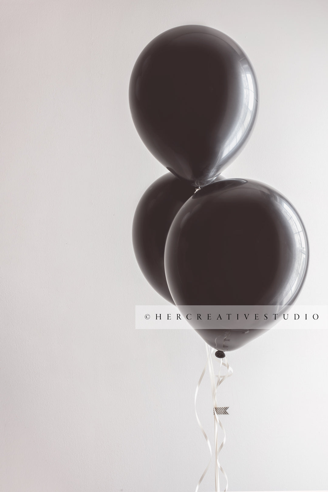 Three Black Balloons, Styled Stock Image