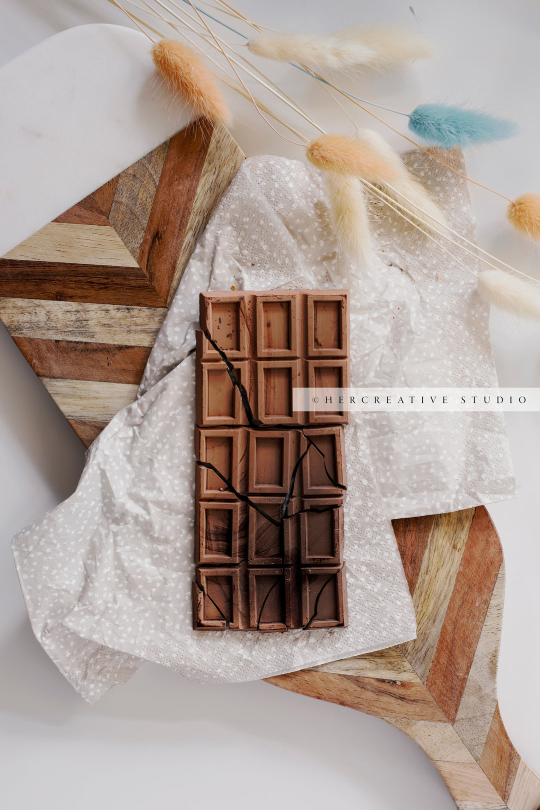 Broken Chocolate with Bunny Tail. Digital Image.