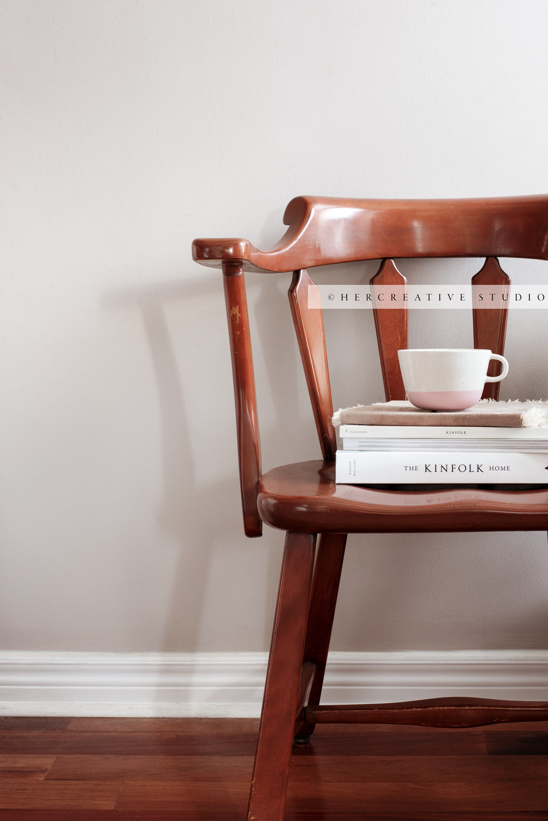 Coffee on Brown Chair. Digital Image.