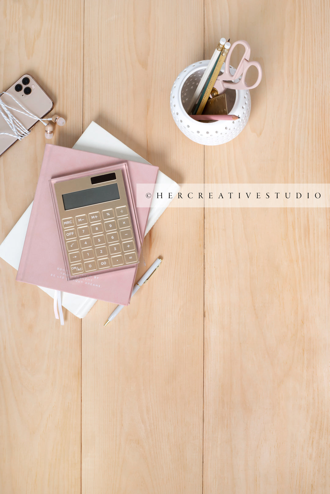 Calculator, Smartphone & Pencil Holder on Light Wood Floor, Styled Stock Image