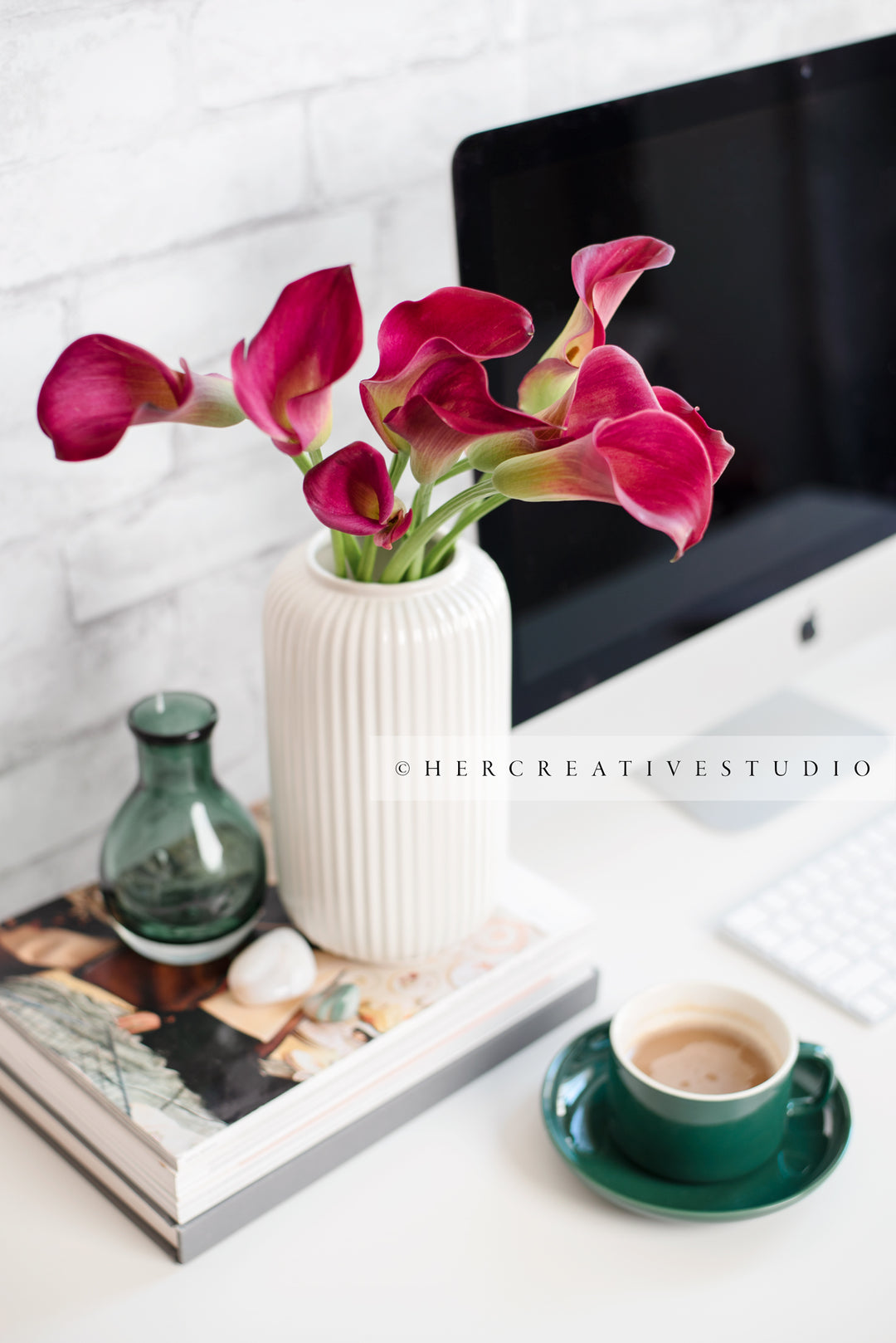 Calla Lilly & Coffee on Workspace. Stock Image.