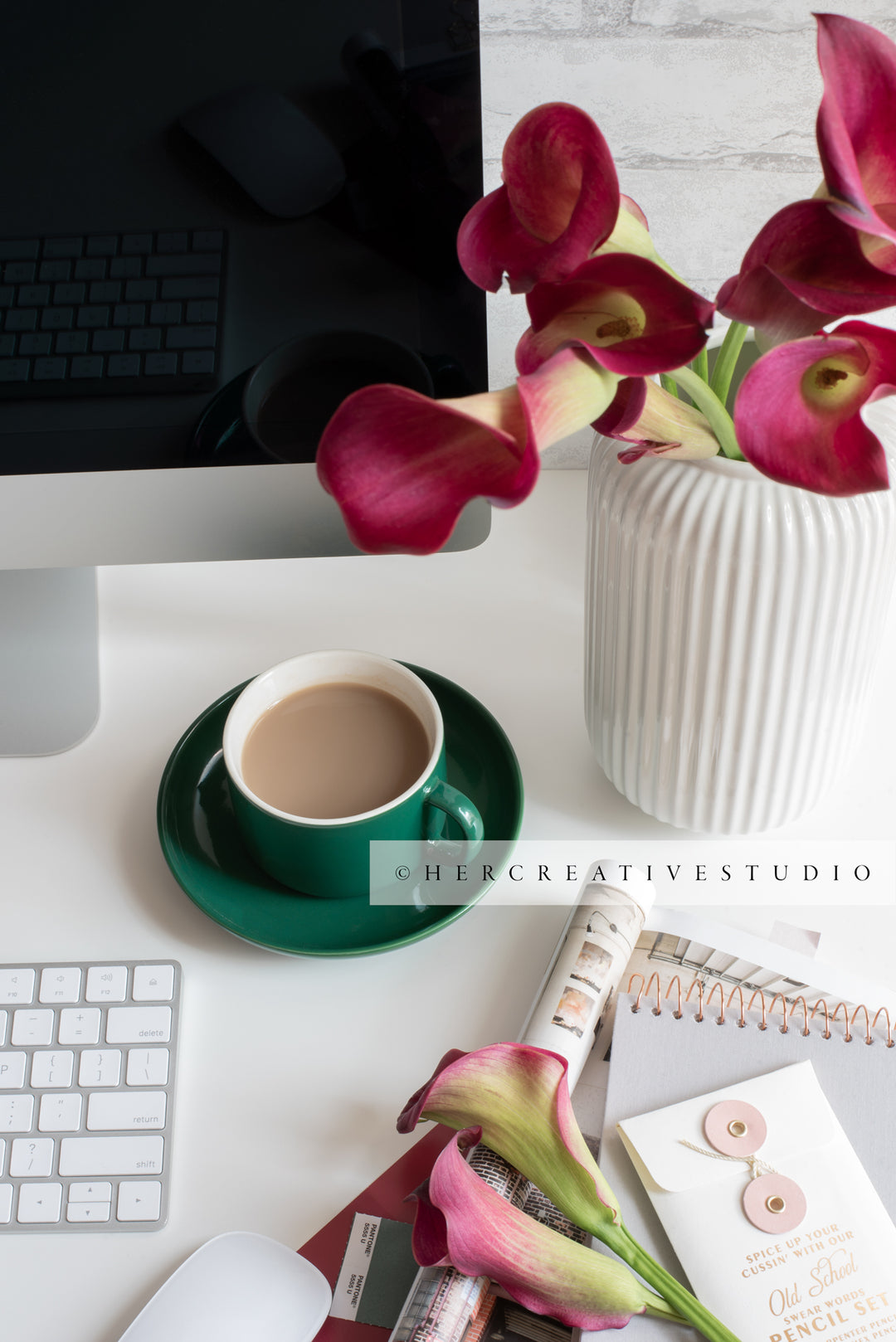 Calla Lilly & Coffee on Workspace. Stock Photo.