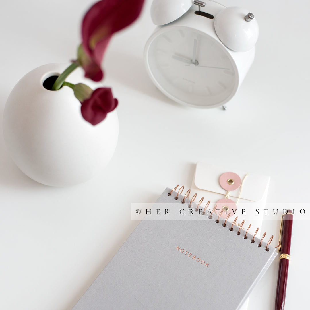 Calla Lilly & Notebook on White Desk