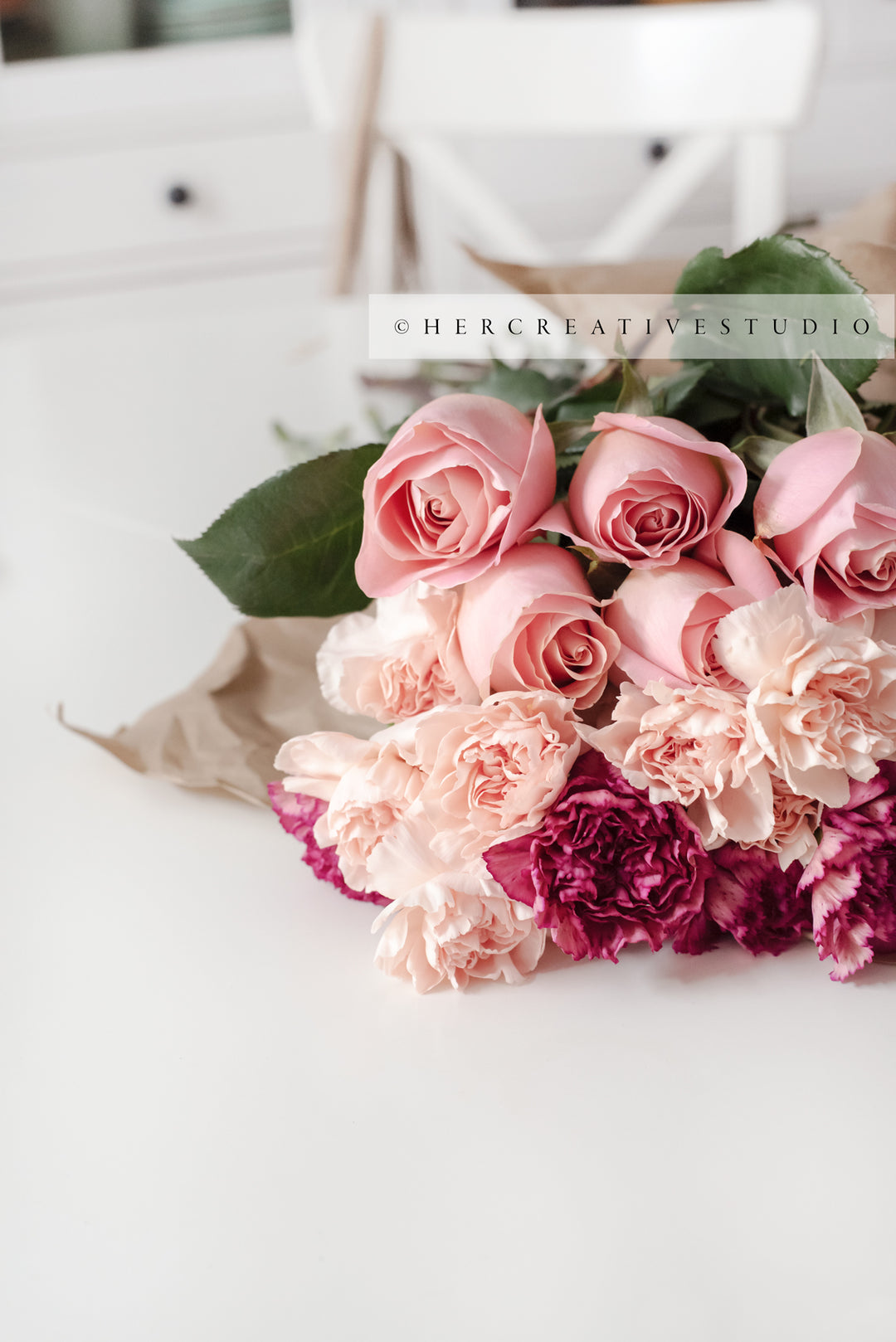 Pink Roses on a White Table, Styled Stock Image