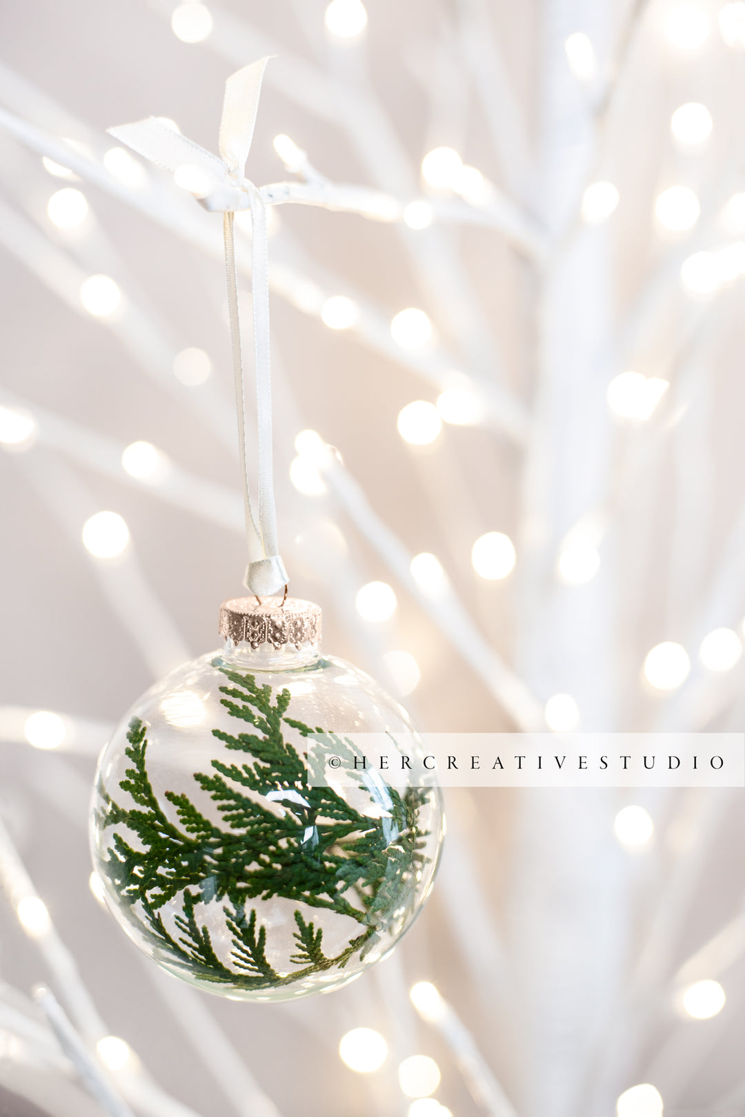 Clear Ornament with Green Trimmings on Tree, Styled Image