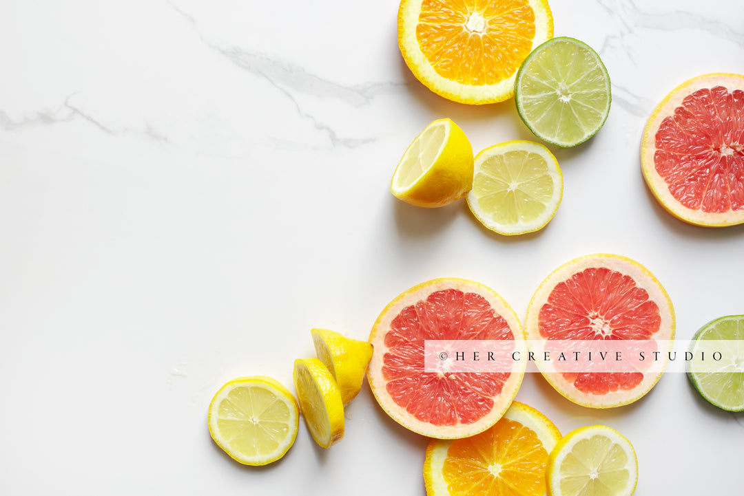 Citrus Slices on Marble Background