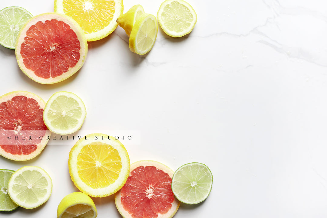 Lemon, Lime & Grapefruit on Marble Background. Stock Photo.