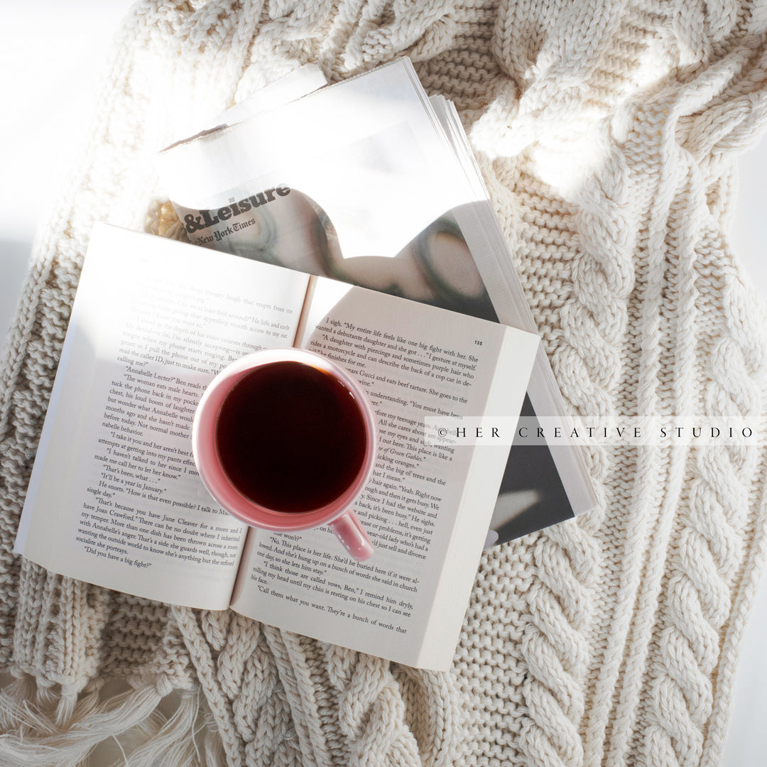 Coffee with a Book in Sunshine. Digital Stock Image.