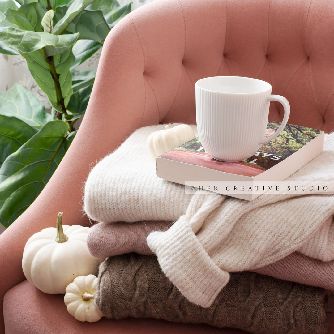 Coffee, Pumpkin & a Book on a Chair. Digital Stock Image.