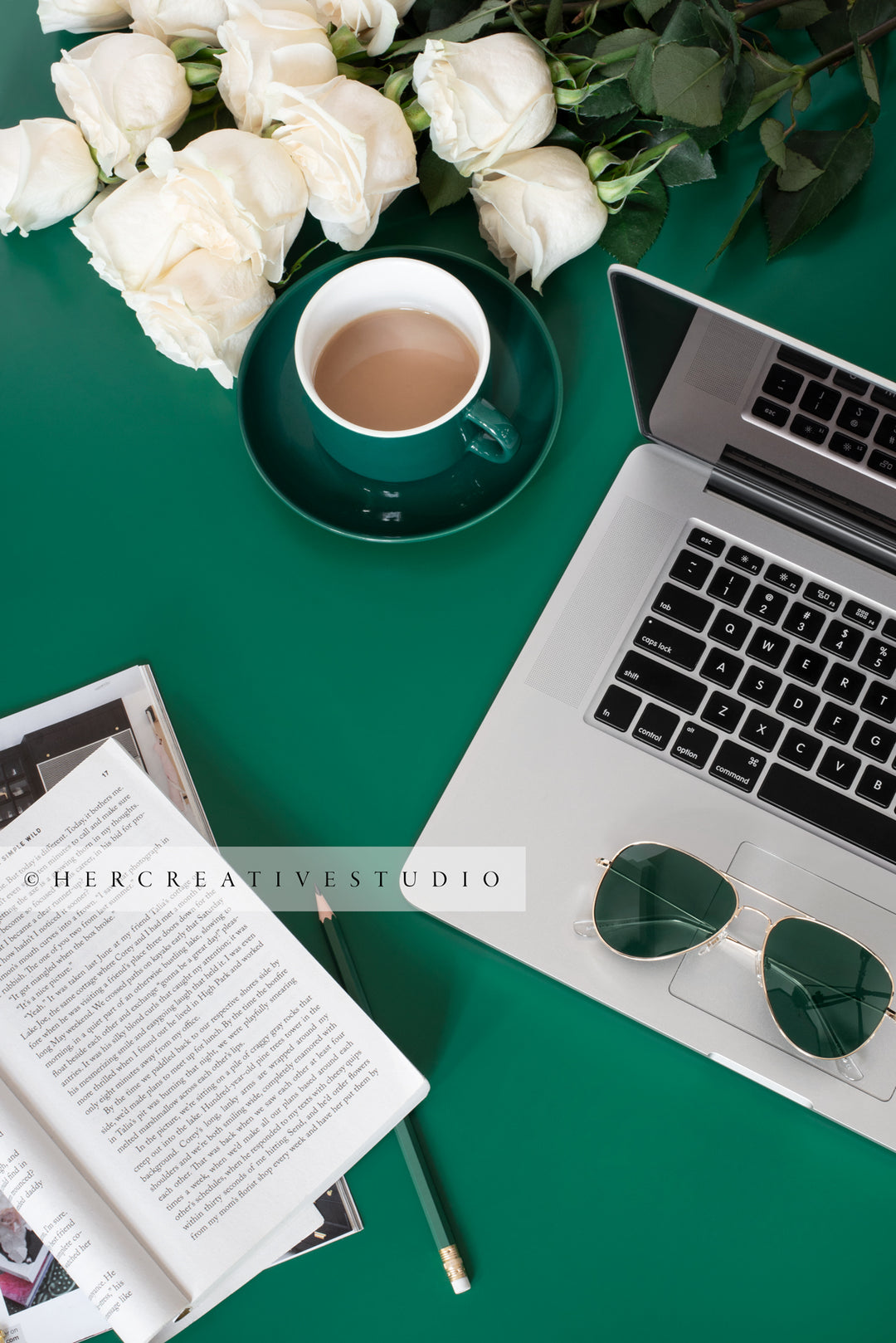 Laptop, Sunglasses & Coffee on Green Background. Digital Stock Image