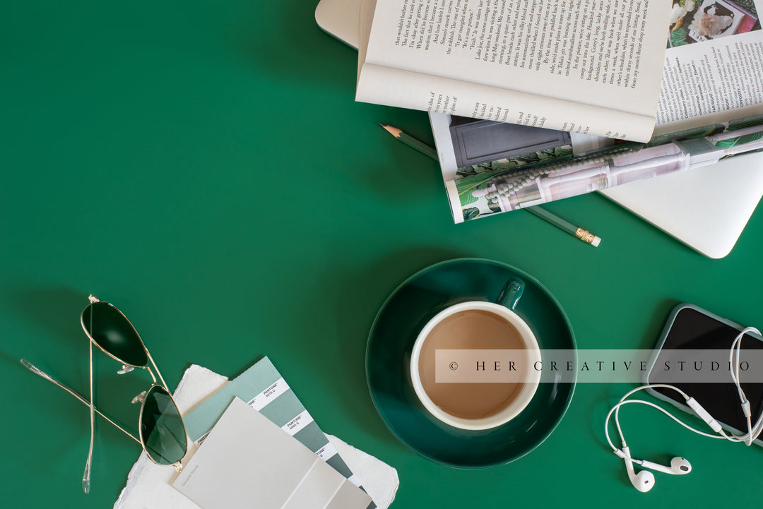 Coffee, Smartphone & Sunglasses on Green Background. Digital Stock Image