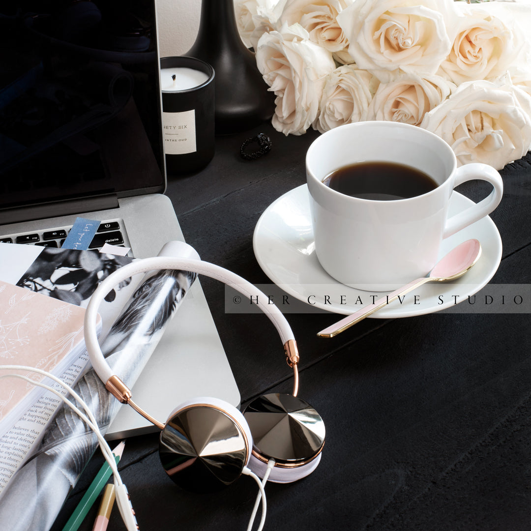 Coffee, Roses & Headphones on Black Desk