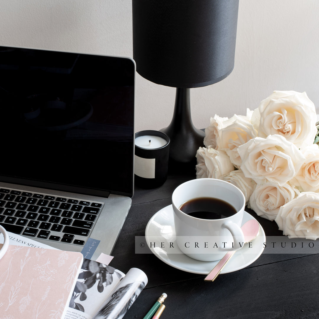 Roses, Laptop & Coffee on a Black Desk