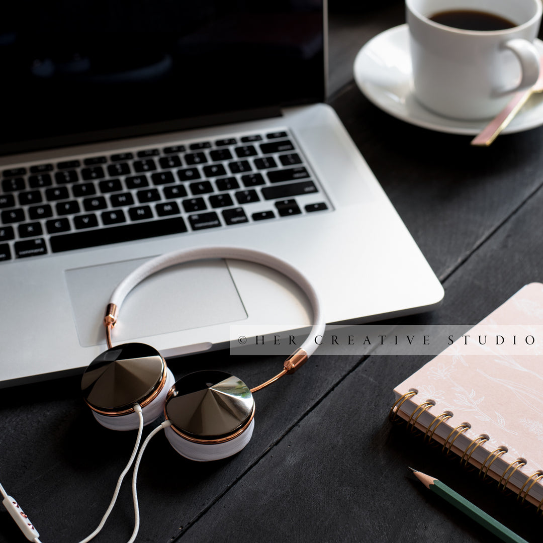 Headphones, Laptop & Coffee on Black Desk