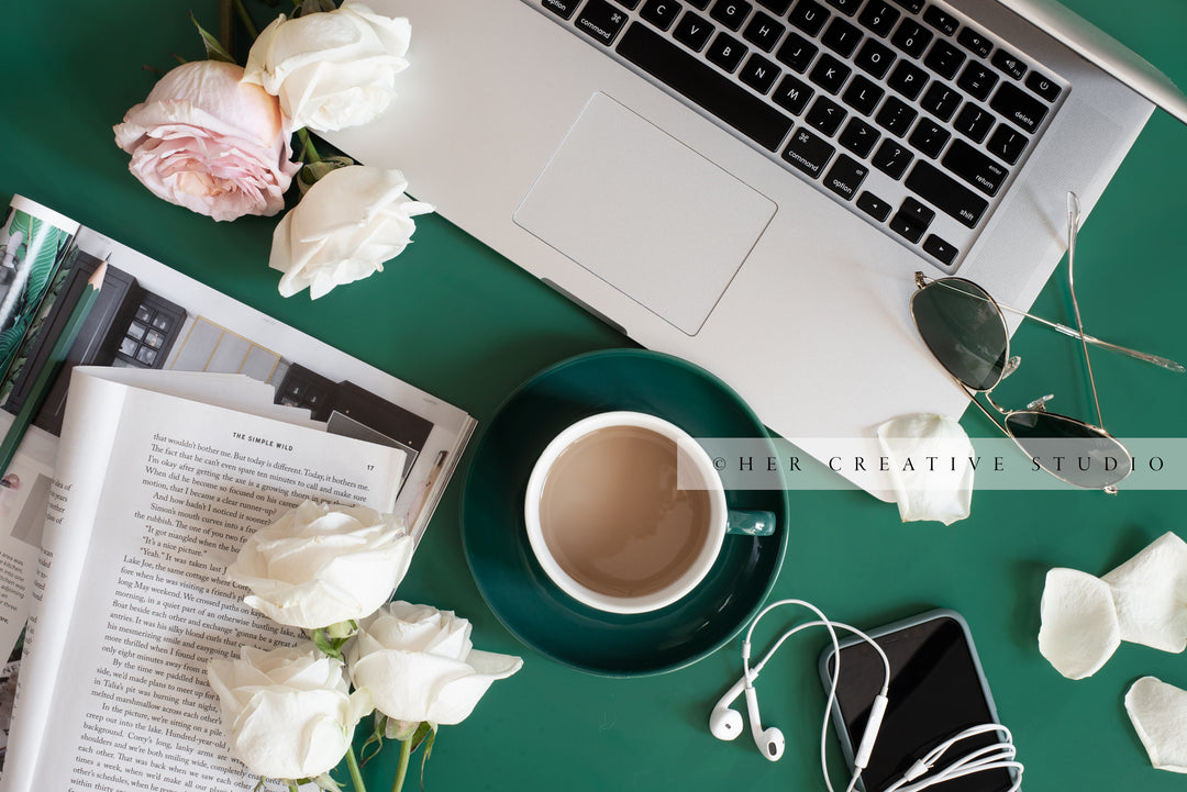 Coffee, Laptop & Roses on Green Background. Digital Stock Image