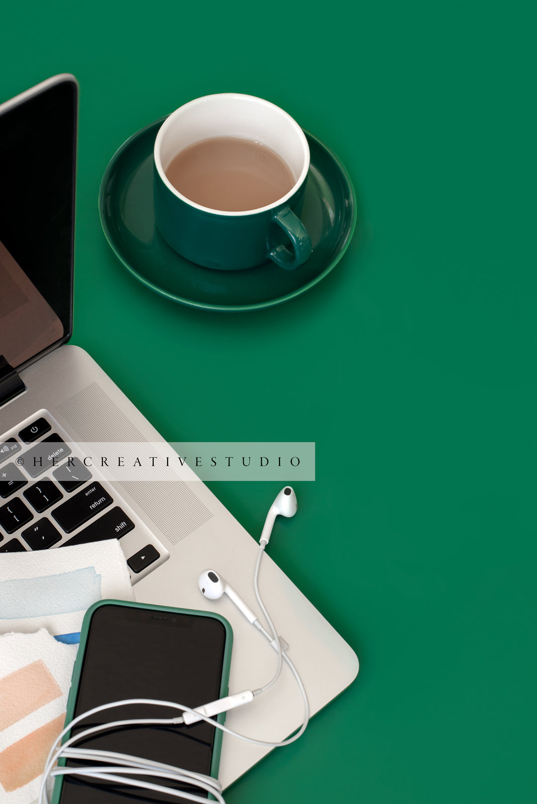 Laptop, Smartphone & Coffee on Green Background. Digital Stock Image