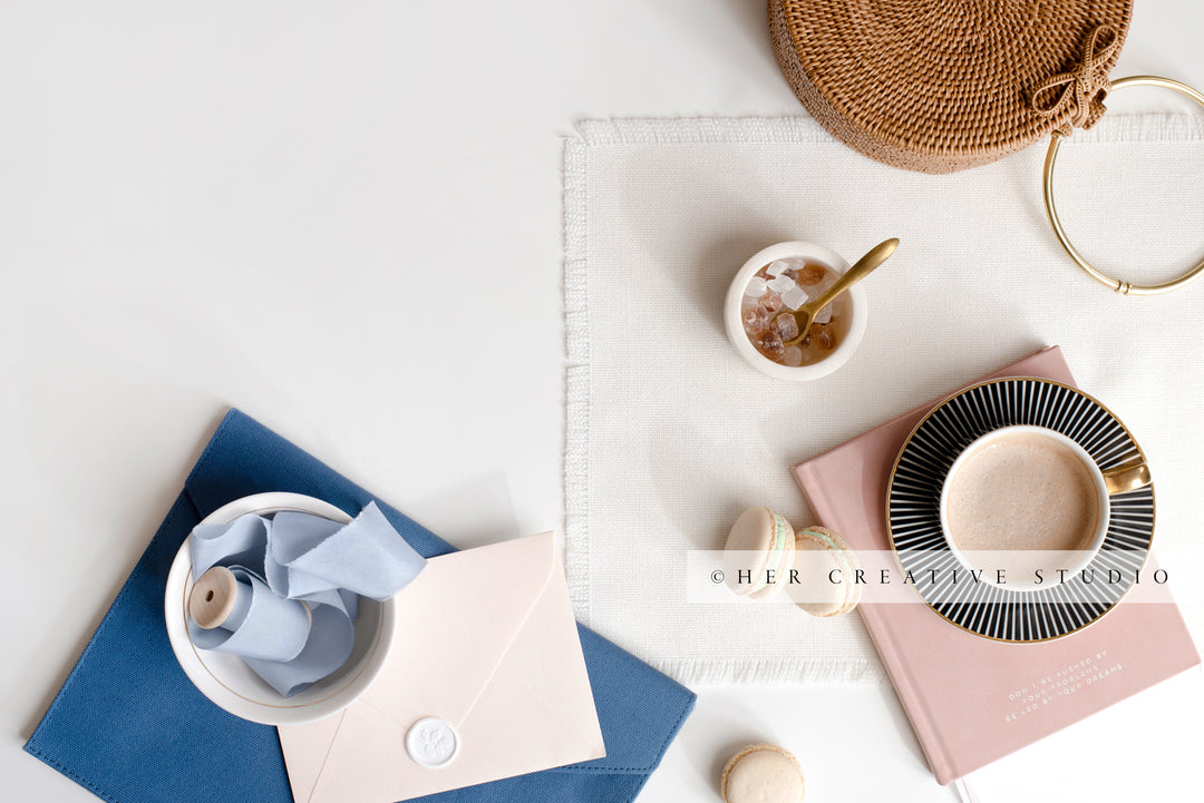 Coffee, Macaroons & Envelopes. Styled Image.