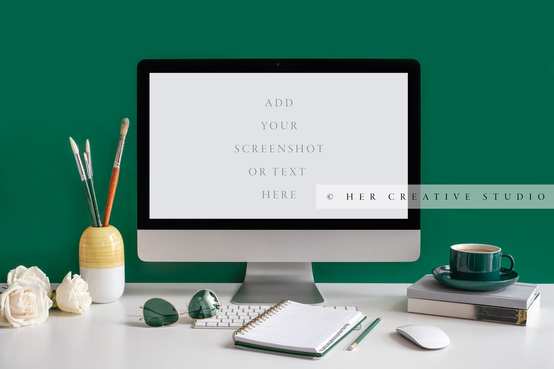 Computer Mockup on Green Workspace, Styled Stock Image