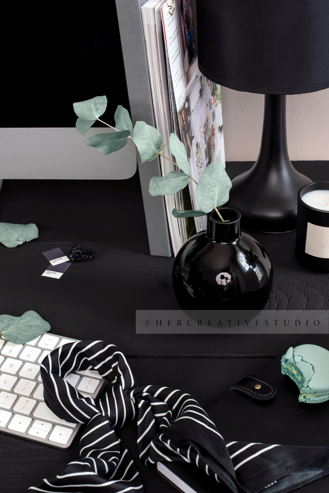 Ecalyptus & Scarf on Black Desk