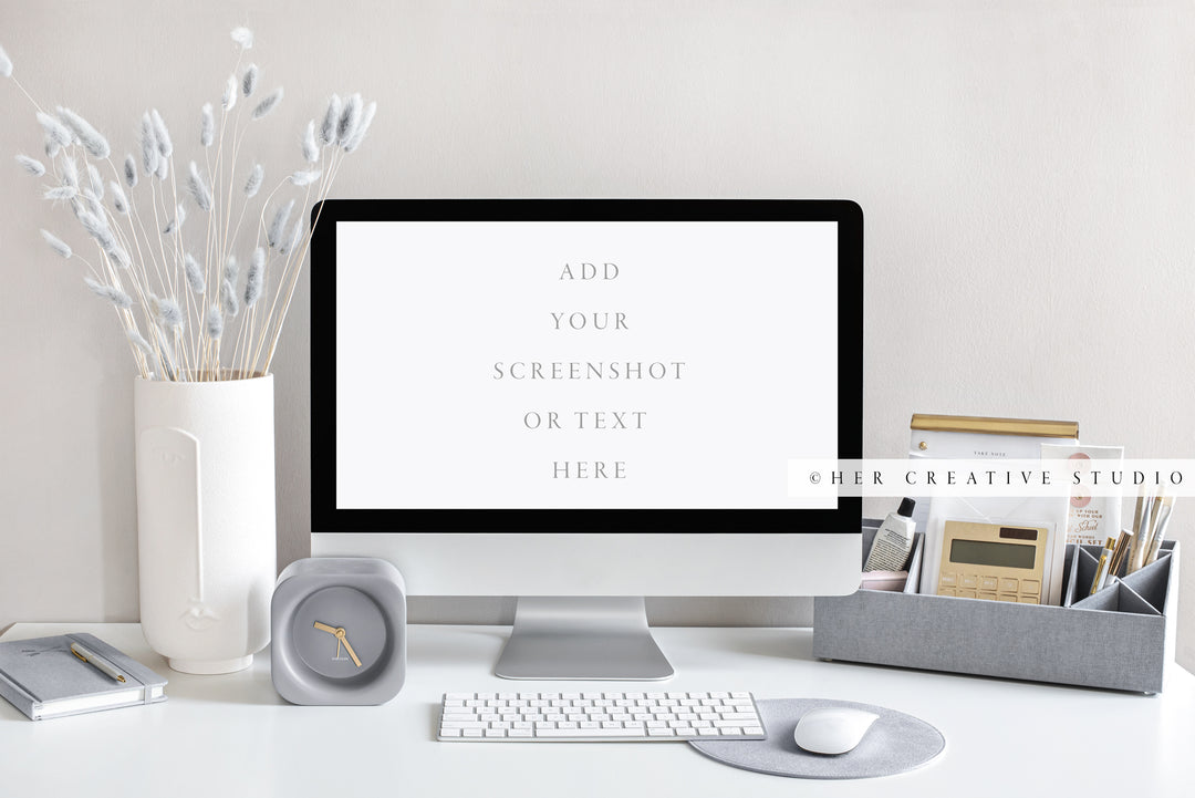 Computer with Grey and Gold Desk Accessories. Stock Image