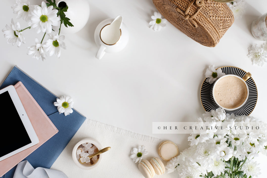 Tablet, Macaroons & Coffe with Daisies. Styled Image.