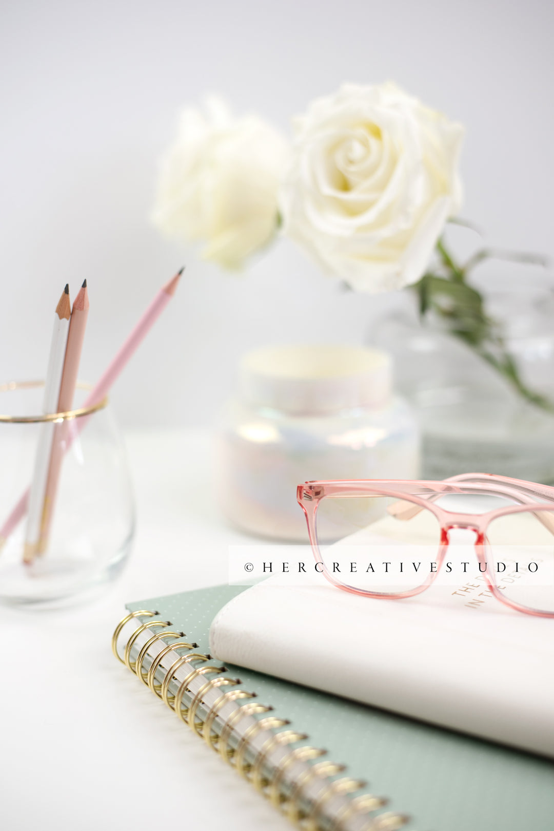 Eyeglasses and Pencils