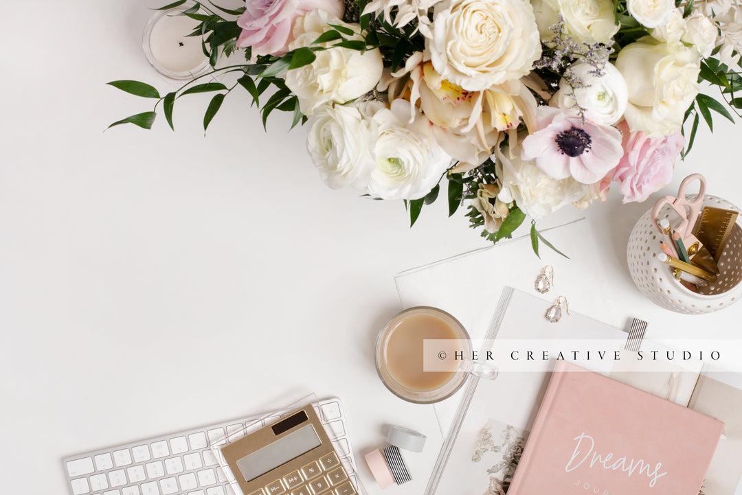 Calculator, Flowers & Pink Notebook on Workspace, Stock Image