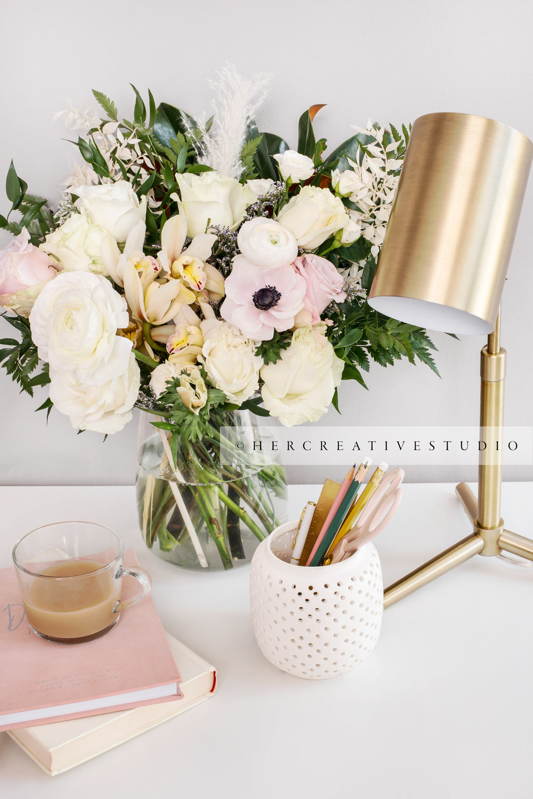 Flowers, Coffee & Gold Lamp on Workspace, Styled Stock Image