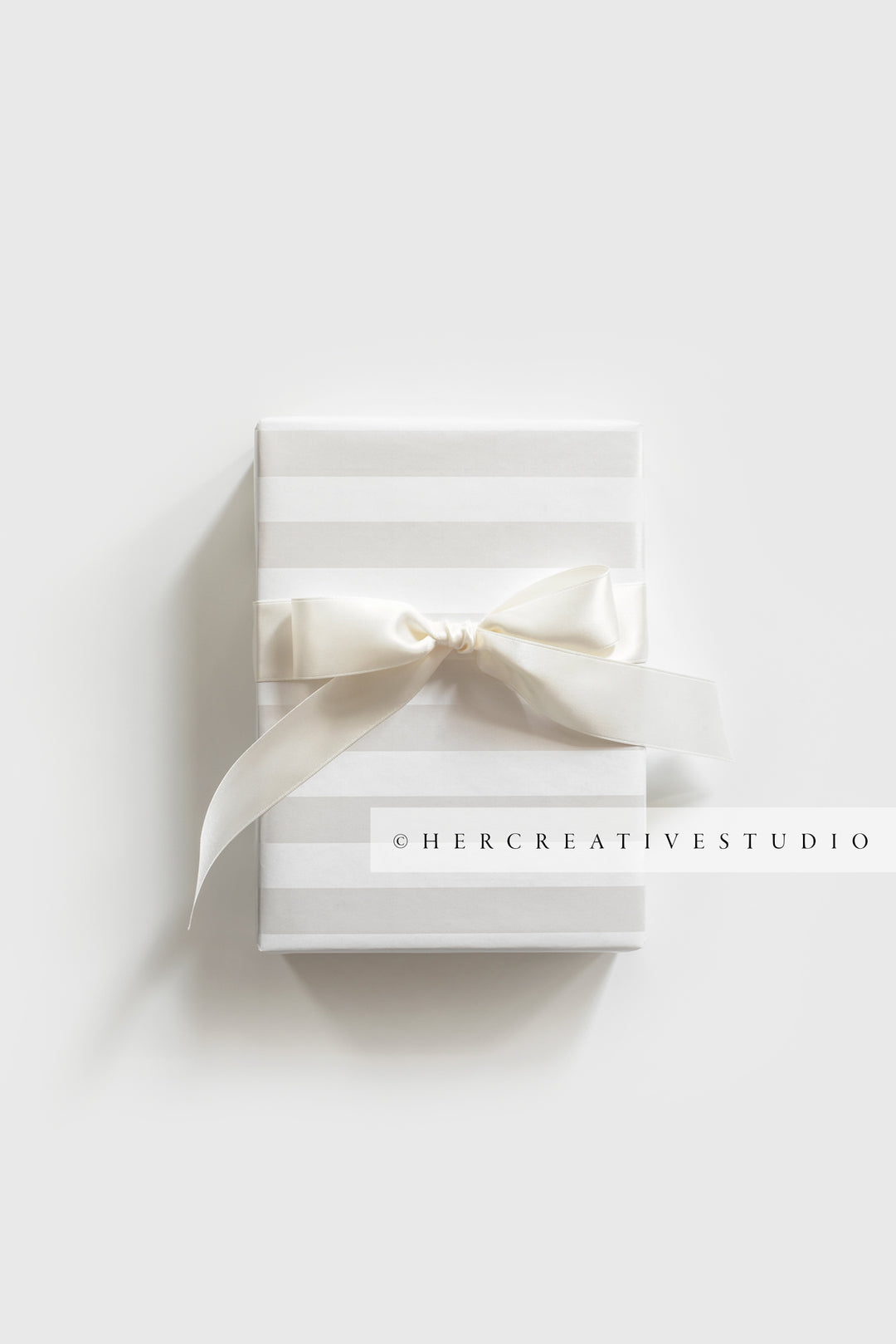 White Gift with White Stripes, Stock Image