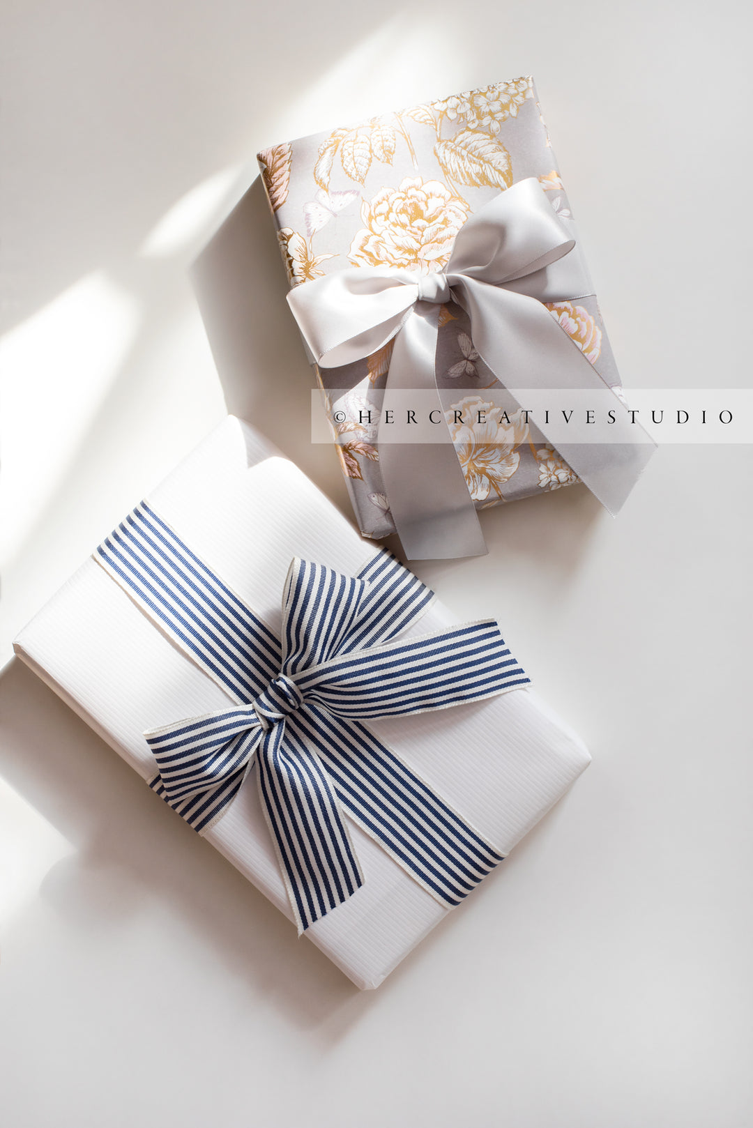 Gifts in Sunlight on White Background, Stock Image