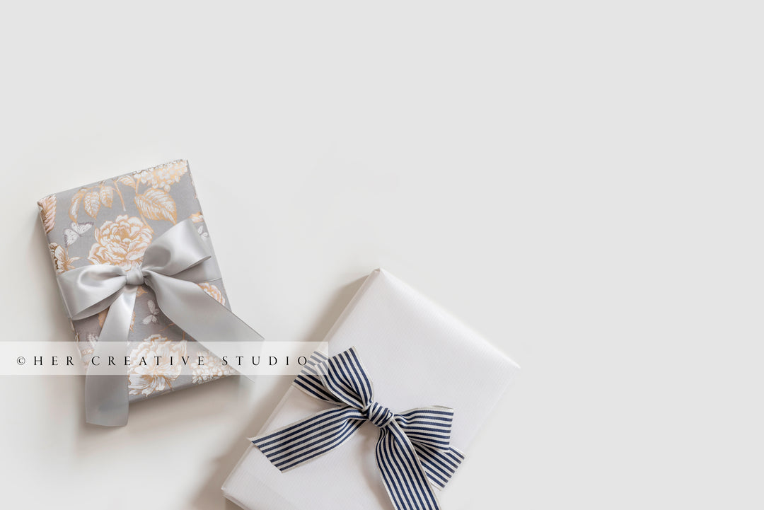 Gifts Wrapped with Ribbon on White Background, Stock Image