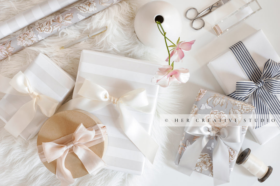 Gifts & Pretty Wrapping Paper on White Background, Stock Image