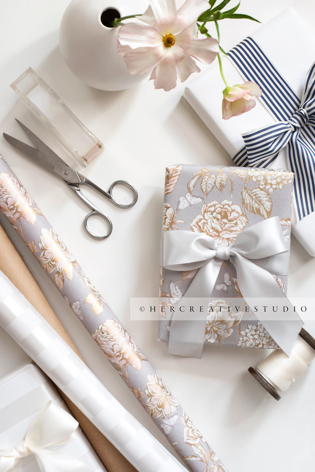 Gifts & Wrapping Paper on White Background. Stock Image