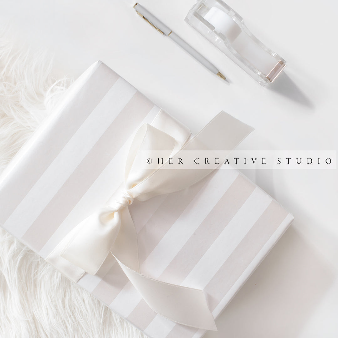 White Gift with Stripes & Ribbon, Stock Image
