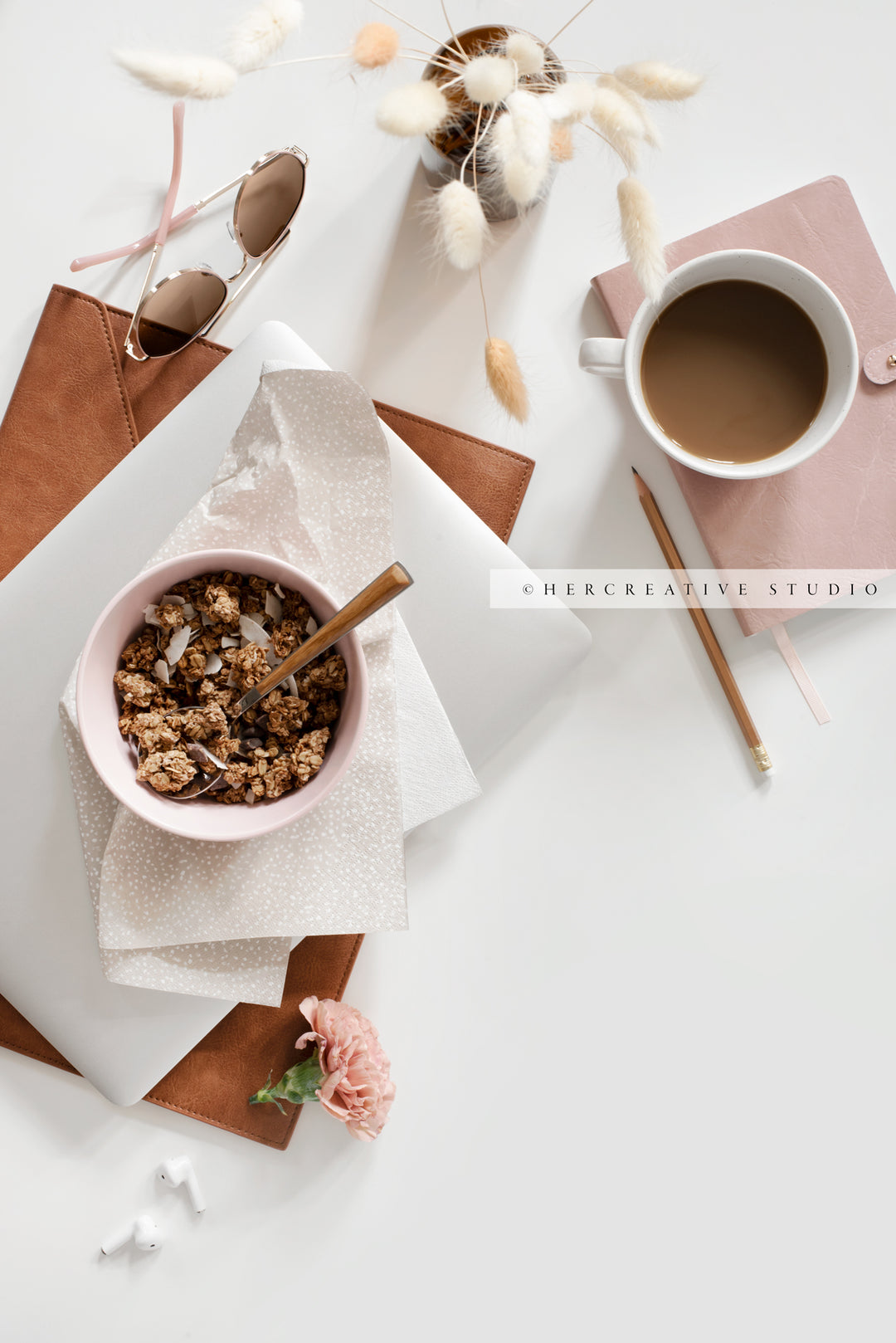 Granola, Laptop & Coffee on White Background. Digital Image.