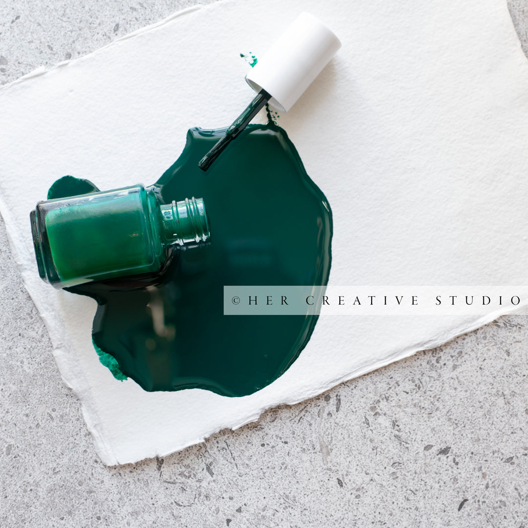Green Nailpolish Spilled Over. Styled Stock Image