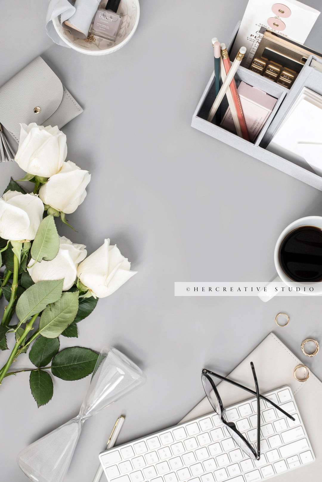 Roses, Hourglass & Coffee on Grey Background. Stock Image