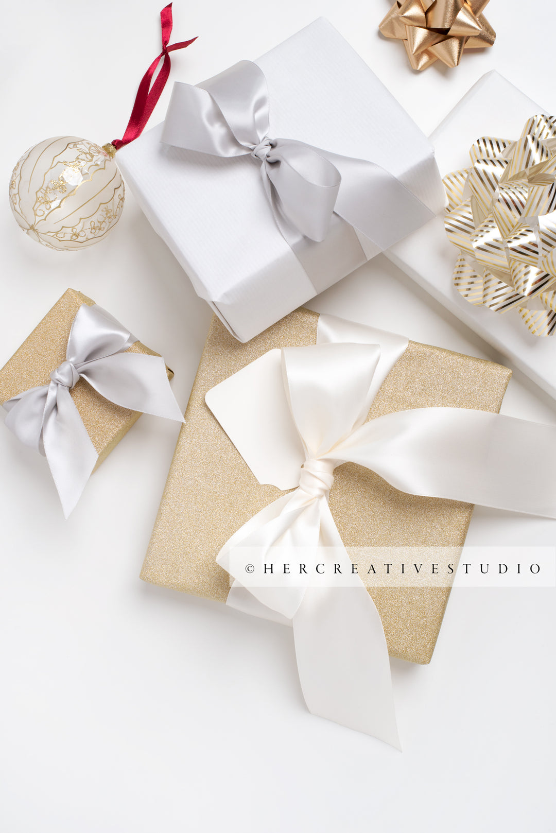 Gold Presents with Ribbon, Ornament on White Background