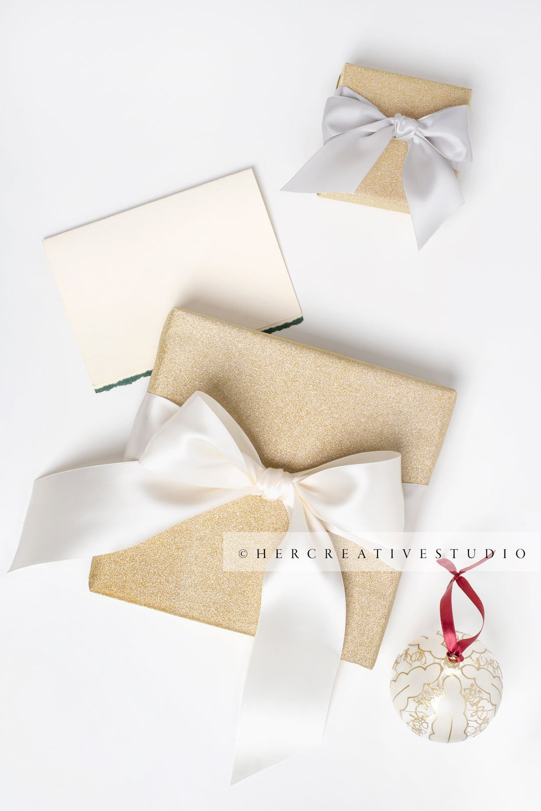 Gold Presents with White & Grey Ribbon & Note Card