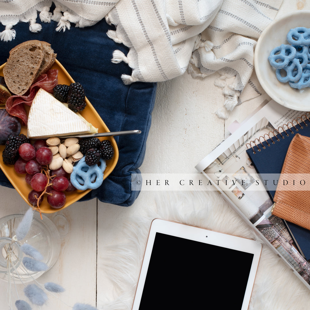 Workspace with Cheese Plate & Tablet. Stock Image