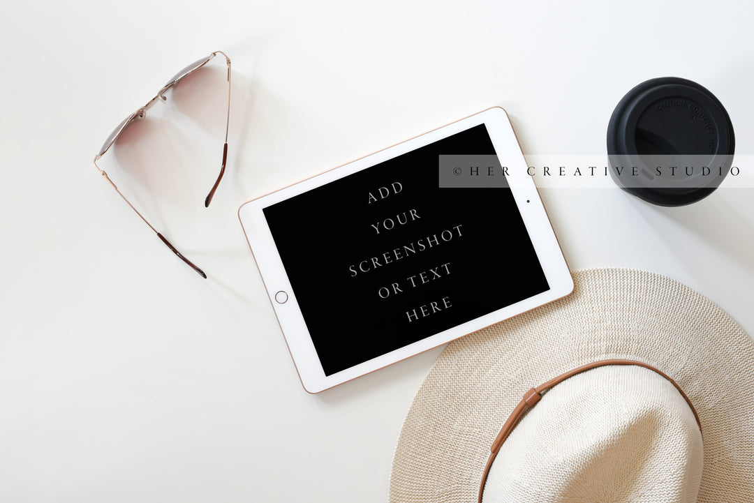 Panama Hat, Tablet with Coffee. Styled Image.