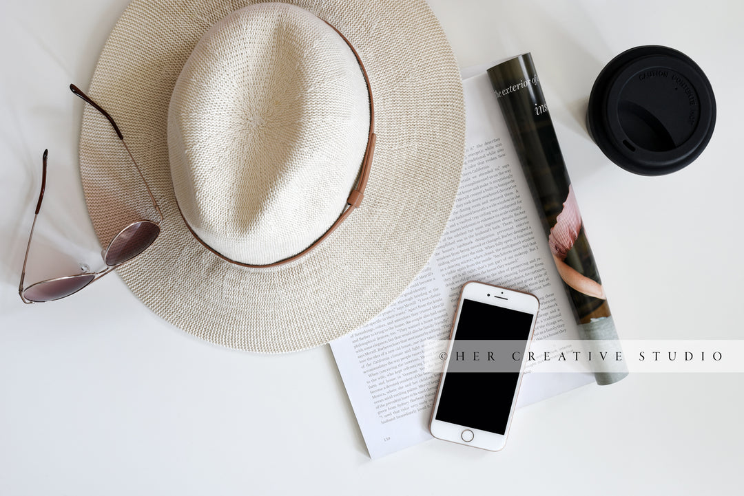 Panama Hat, Smartphone with Sunglasses. Styled Image.