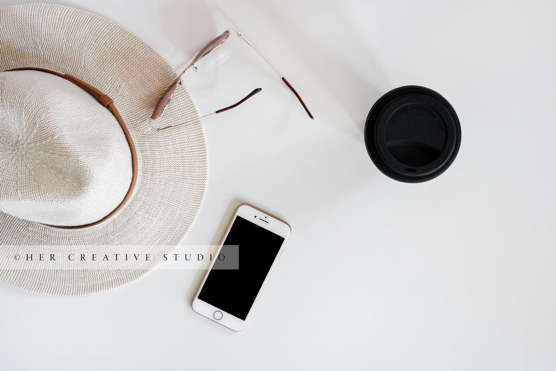 Panama Hat, Smartphone with Coffee. Styled Image.