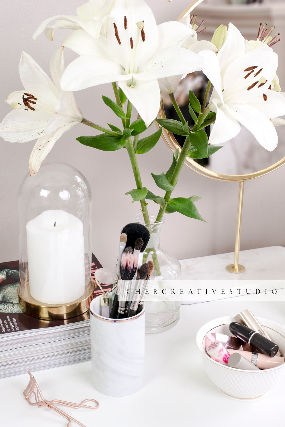 Lillies & Makeup on Table, Styled Stock