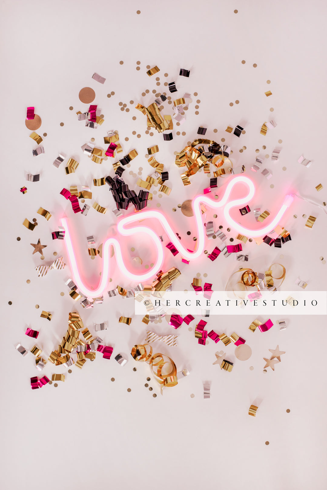 Neon Pink 'Love' with Confetti, Styled Stock Image